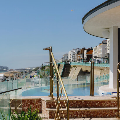 Guests are treated to a visual feast as they explore the house, encountering artfully arranged decor, plush furnishings, and panoramic windows that capture the breathtaking vistas of Brighton's iconic beachfront