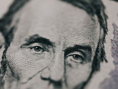 Closeup of a president printed on bill looking away