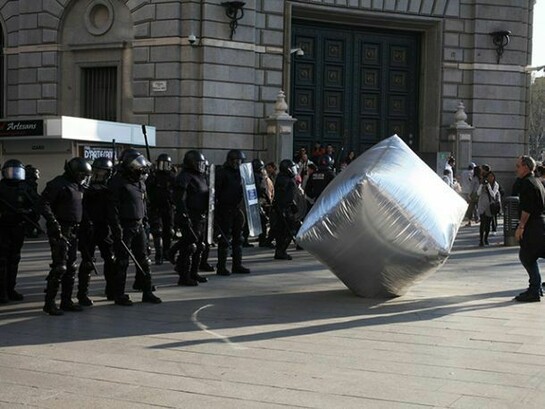 Inflatable cobblestone, action of Eclectic Electric Collective in co-operation with Enmedio collective during the General Strike in Barcelona, 2012, © Oriana Eliçabe/Enmedio.info