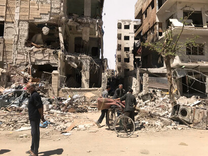 Las blasfemias abominables del régimen asesino continuaban, como lo hacían los intereses creados por grupos armados y las atrocidades alimentadas por las potencias occidentales