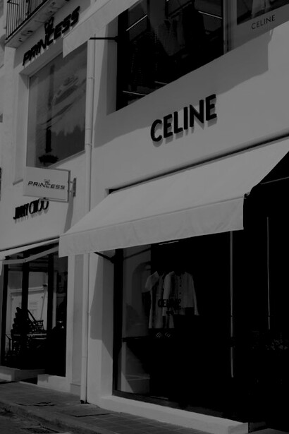 White storefronts for the luxury brands Celine and Jimmy Choo