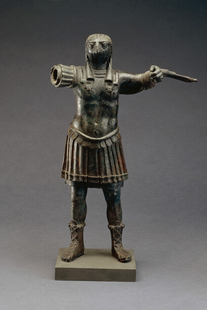 Standing figure of the Roman god Horus, wearing Roman military costume, bronze, Egypt, 1st–2nd century AD, © The Trustees of the British Museum