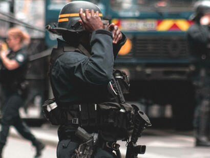 A police officer in the US with an arsenal of equipment