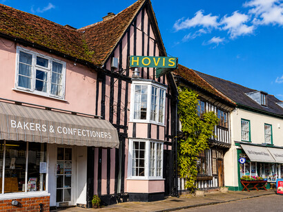 People shopping in Lavenham Market Place, Suffolk, England