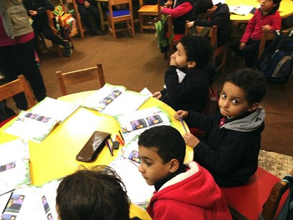 Children holding the new Education 2.0 books in Cairo, Egypt, 2019