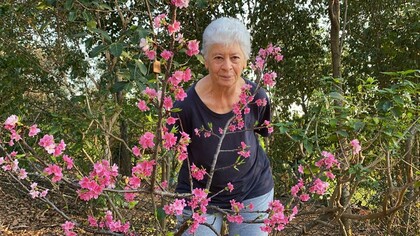 Irma Passoni com suas plantas