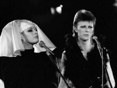 21st October 1973: British singer and actress Marianne Faithfull on stage with David Bowie at a live recording for a Midnight Special TV show made at The Marquee Club in London to a specially invited audience of Bowie fanclub members. (Photo by Jack Kay/Express/Getty Images)

