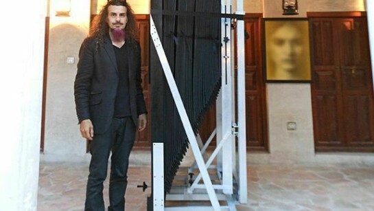Artist Halim Al Karim with his custom camera. Courtesy of the artist and Robischon Gallery.