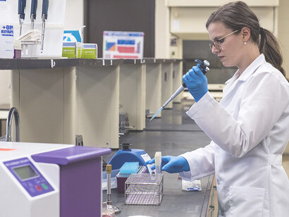 Jennifer Acuff, Assistant Professor of Food Microbiology and Safety in the Department of Food Science, researches strategies to enhance the safety of fresh and processed foods, focusing on safeguarding food products from microbial contamination, photo credit: UA System Division of Agriculture, Fred Miller