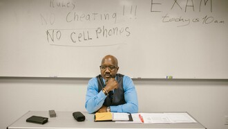Teacher reflecting on his practice