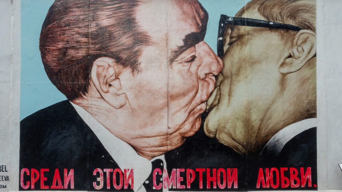 Notorious Berlin Wall graffiti depicting USSR's Leonid Brézhnev kissing Eastern Germany's Erich Honecker, Berlin, Germany