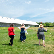 Guests participating in the installation of Wishing the mountains madness 1977 / 2026 during Community Day at the Parrish Art Museum. Courtesy of Parrish Art Museum