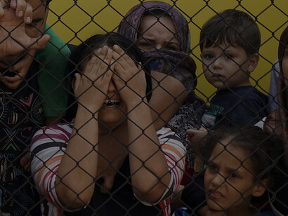 Women and children among Syrian refugees striking at the platform of Budapest Keleti railway station during the refugee crisis in Central Europe. Budapest, Hungary, September 4, 2015
