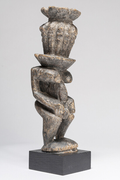 Dogon peoples, Figure (Dege), mid 20th century or earlier, Mali, Bandiagara Circle, Wood and sacrificial encrustation. With base: 11 3/4 × 3 1/8 × 4 1/4 in. (29.8 × 7.9 × 10.8 cm). Photo: Paul Hester
