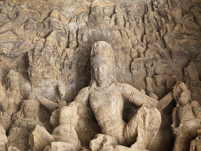 Ellora, Cave 16, depicting Ravana shaking Mount Kailasa, is part of the Ellora archaeological site in Maharashtra, India, built under the Rashtrakuta dynasty and renowned for its monumental rock-cut caves