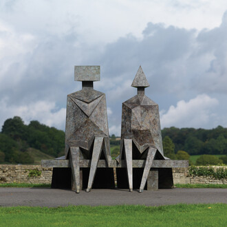 Lynn Chadwick, Sitting Couple on a Bench (front), 1990, Bronze, Edition 2 of 9, 194 x 211 x 183 cm, Courtesy of Pangolin London