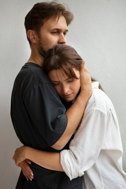 A young couple experiencing the challenges of separation anxiety