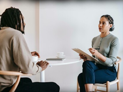 Man discussing his mental health with therapist