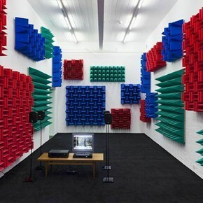 Haroon Mirza , Digital Switchover, 2012, Installation View, Kunst Halle Sankt Gallen, St.Gallen, 2012, 1 x control box, 4 x active speakers, 1 x relay, 1 x DVD player, 1 x TFT monitor, LEDs, foam. Courtesy the artist and Kunst Halle Sankt Gallen, Photo Gunnar Meier, © Haroon Mirza