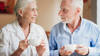 Older adults enjoying tea together, highlighting the benefits of tea antioxidants for bone health