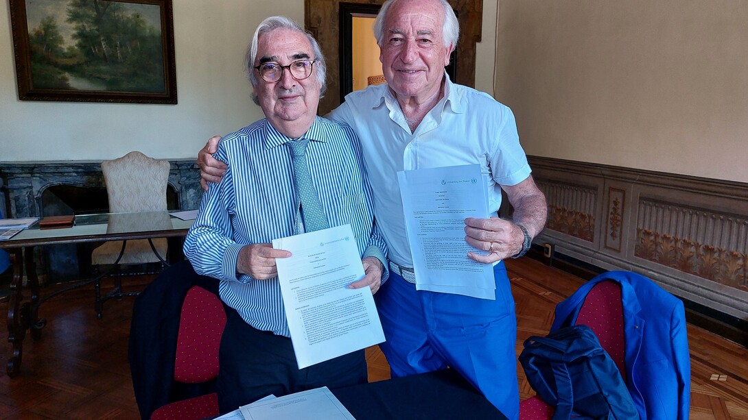 Francisco Rojas Aravena, Rector of the United Nations University for Peace, and Salvatore Grasso, author of the Anthem of the United Nations University for Peace, at the signing