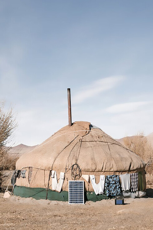 A yurt is a portable, circular dwelling constructed from a lattice of flexible poles and covered with felt or other fabric, Mongolia