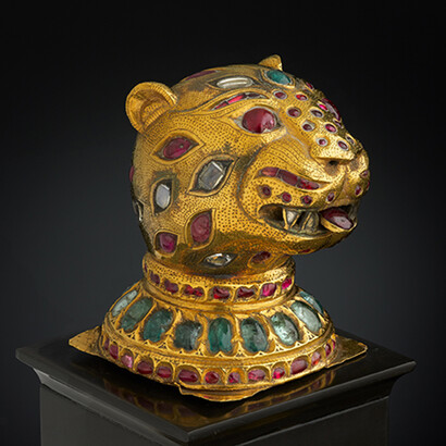 Finial from the Throne of Tipu Sultan, South India, Mysore, ca. 1790, Gold, inlaid with diamonds, rubies, and emeralds; lac core, H. 2-3/4 in. (6.8 cm), W. 2-1/8 in. (5.4 cm), D 2-1/4 in. (5.5 cm), Al-Thani Collection. Image: © Servette Overseas Limited 2013. All rights reserved.