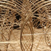 Kristoffer Myskja, Machine that uses a thousand years to shut itself down 2006 brass, drive belts, motor, steel, solar panels, MDF base, 37,5 x 24,5 x 25 cm