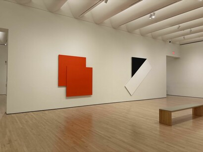 Installation view at the San Francisco Museum of Modern Art (SFMOMA) featuring Ellsworth Kelly’s Red on Red (2001, oil on canvas) and Black Triangle with White (1976, oil on canvas), both from the Doris and Donald Fisher Collection. Photo: © İdil Burkutoğlu
