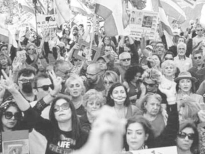 Men and women peacefully assemble to protest the Iranian government in Iran