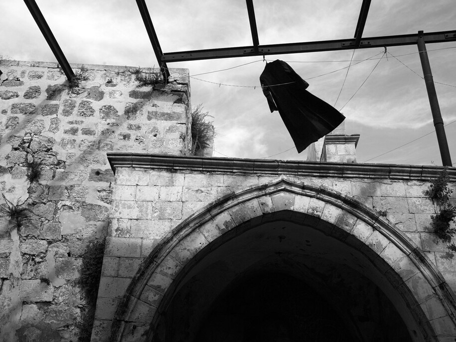 Kathryn Cook, A priest's frock hands out at an Armenian abbey in Jerusalem.