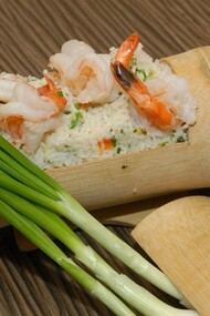Prawns fried and rice served in bamboo custom