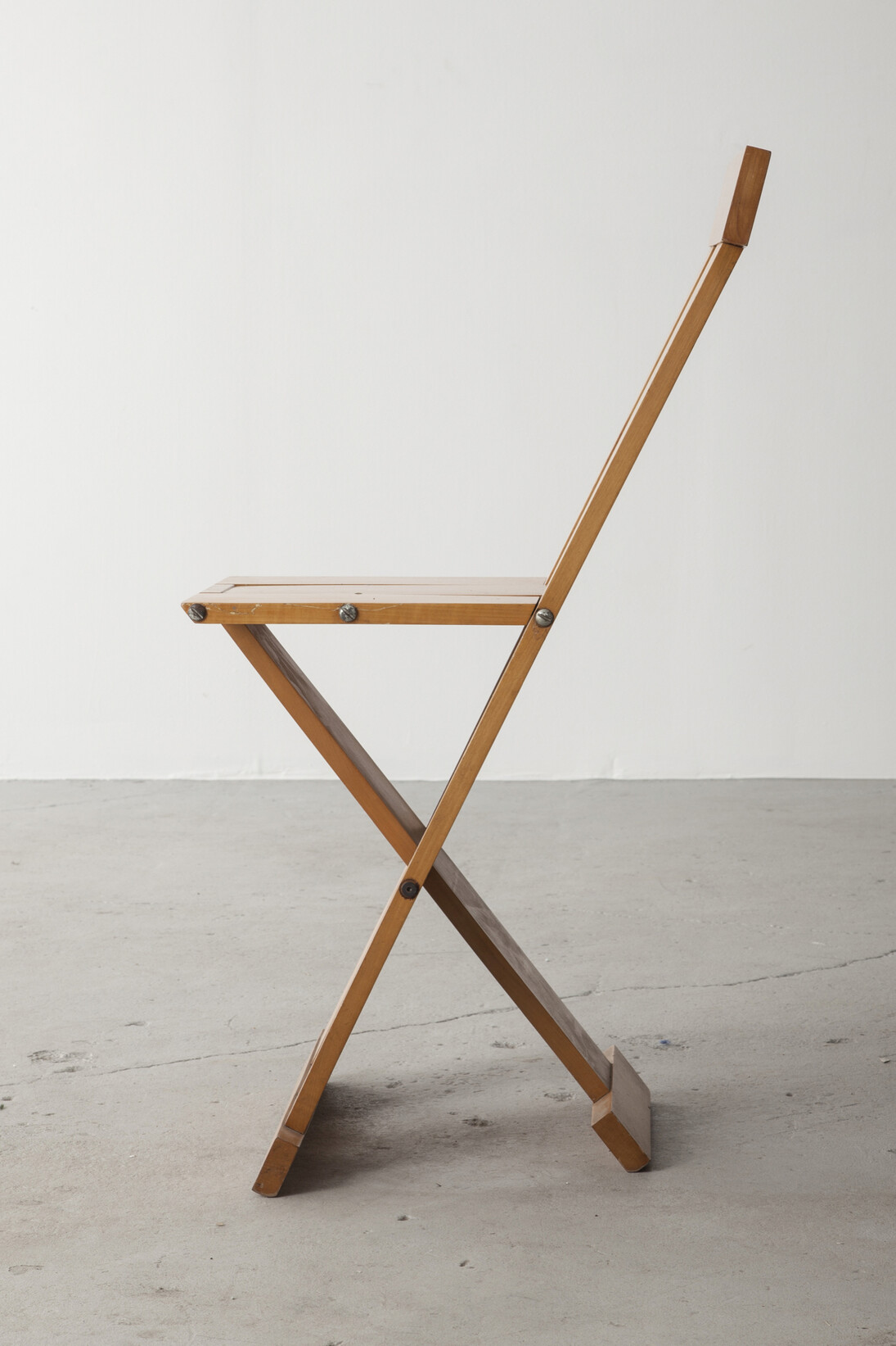 Prototype of the "Frei Egidio" chair. Designed by Lina Bo Bardi, Marcelo Ferraz and Marcelo Suzuki, Brazil, 1980s. 11" L x 14.25" W x 33" H / 27.94cm L x 36.2cm W x 83.82cm H. Photo: Joe Kramm/R & Company.