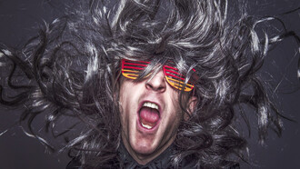 Musician wearing colorful glasses