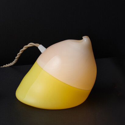 Michiko Sakano, Incalmo Droplet (detail), 2023. Blown glass/light fixture,
6 x 6 1/2 x 6 1/2 in. (15.2 x 16.5 x 16.5 cm). Courtesy of the artist and Heller Gallery