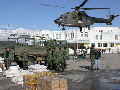 KFOR airlifts humanitarian assistance to Albania
