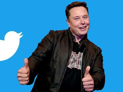 Elon Musk giving two thumbs up after his latest purchase of Twitter