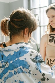Person having their body painted 