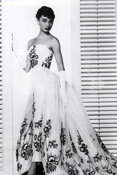 Audrey Hepburn in Sabrina (1954), wearing the iconic black dress designed by Hubert de Givenchy