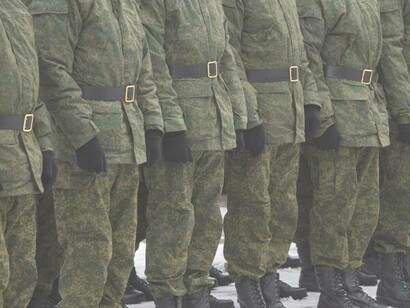 Russian military officers lining up in the snow