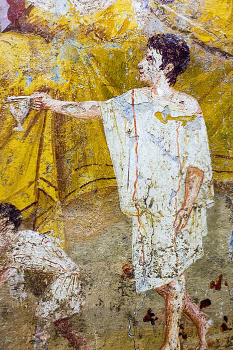 Wall painting (fresco) depicting a late banquet scene, with a participant vomiting while supported by a slave and accompanied by incised graffiti such as “SCIO” and “BIBO,” from Pompeii (V 2, 4, triclinium), dating to the Third Style, circa 50 AD, now in the Museo Archeologico Nazionale, Naples, Italy
