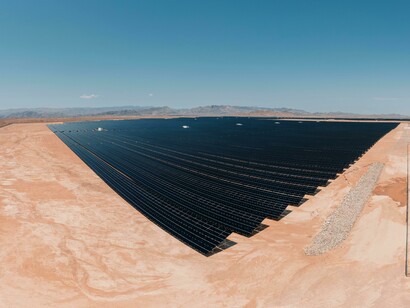 United States: An aerial view of a desert landscape covered with solar panels
