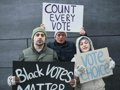 Demonstrators passionately calling for fair representation, reflecting the exhaustion building within modern political systems