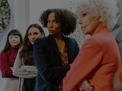 Businesswomen posing together for a group photograph