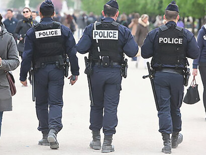 French police control the street Tuileries garden, Paris, France