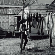 Glen O'Malley, Good friday 1987, Kelvin Grove, Brisbane. Gerard and his girlfriend hung out his washing (from 'Journeys north' portfolio) 1987. Courtesy of Queensland Art Gallery
