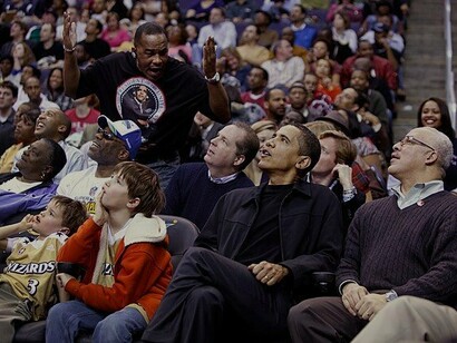 President Barack Obama attends a Washington Wizards vs Chicago Bulls basketball game at the Verizon Center, Washington, D.C., America