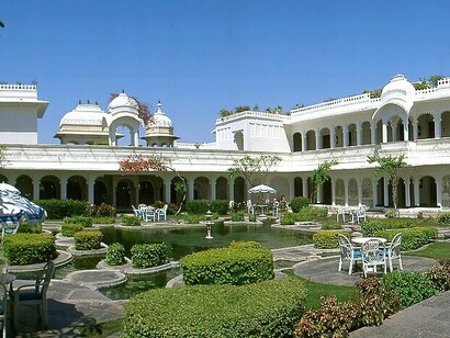 The courtyard of the Lake Palace Hotel in Udaipur, Rajasthan, India, offers a serene and majestic setting, India