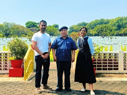 People in Ereveld Ancol cemetery in Jakarta, symbolising how memory survives even when justice does not