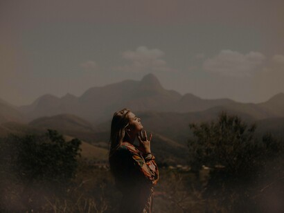 Praying in the mountainous region of Switzerland as a means to maintain the belief from within